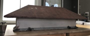 Metal Museum Skylight Vent with white base and red hood