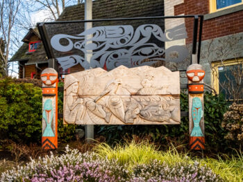 The sculpture “Marsh Life” is a carved mural by artist Ty Juvinel