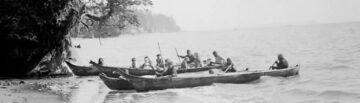 Coast Salish landing on shore.